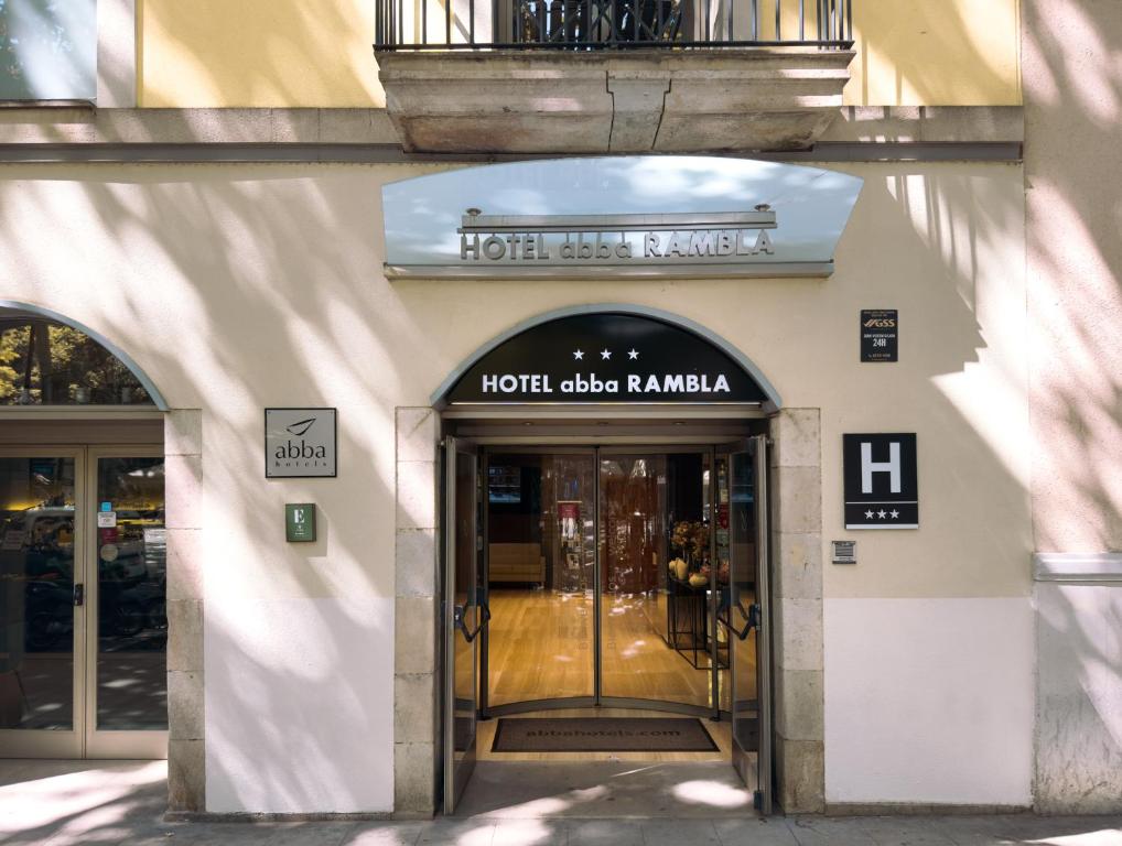 an entrance to a hotel called roma in a building at Abba Rambla Hotel in Barcelona