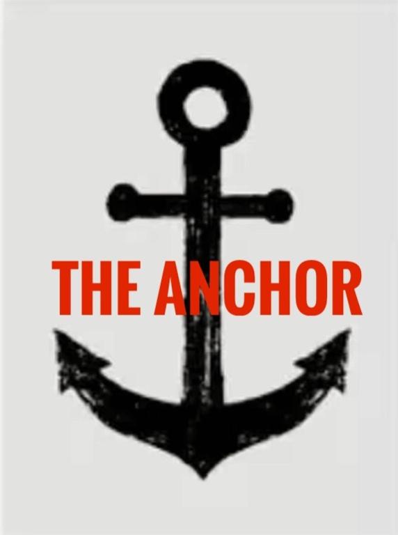 an anchor sign with the words the anchor at THE ANCHOR in Hastings