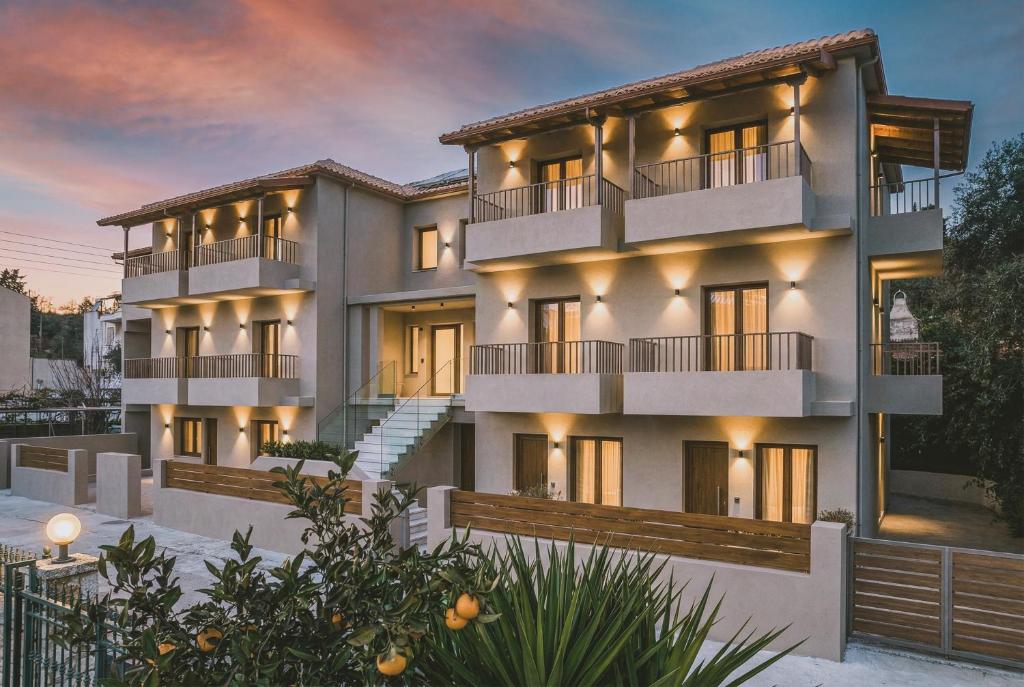 a rendering of a building with lights on at EMERALD Luxury Living in Syvota