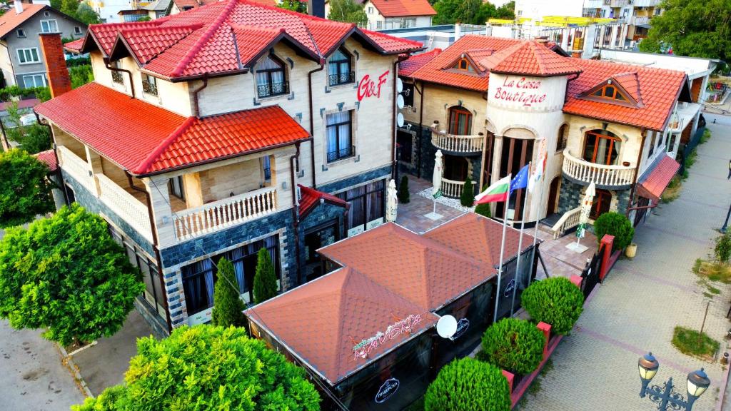 an overhead view of a large house with red roofs at La Casa Boutique in Kostinbrod