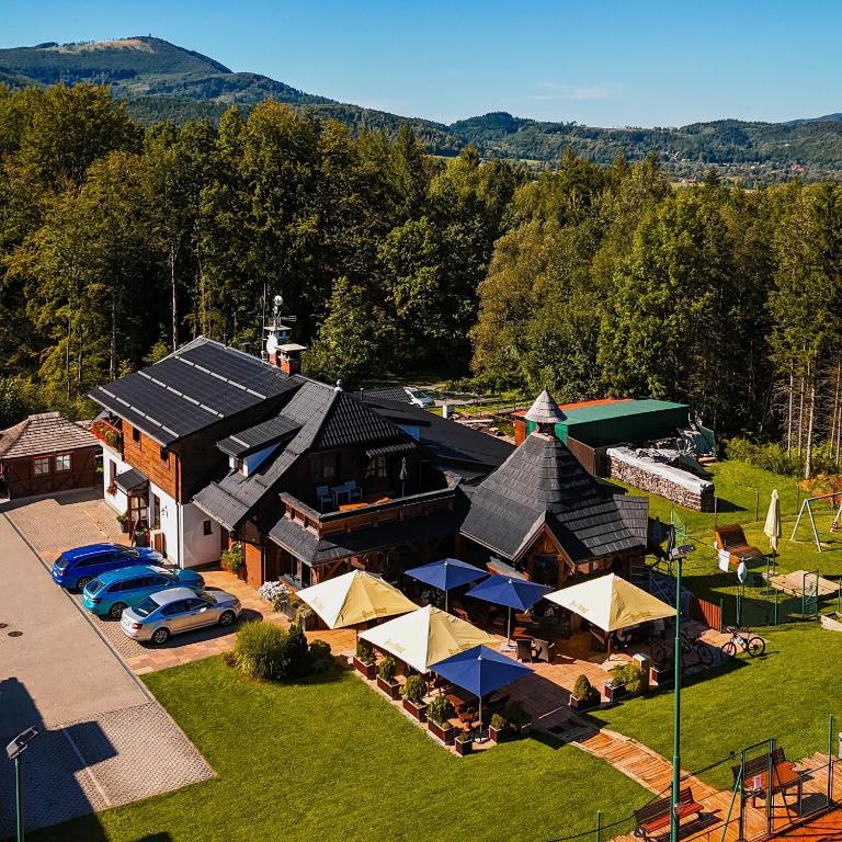 an overhead view of a building with tents and cars at Hotel Na Dolině in Frenštát pod Radhoštěm