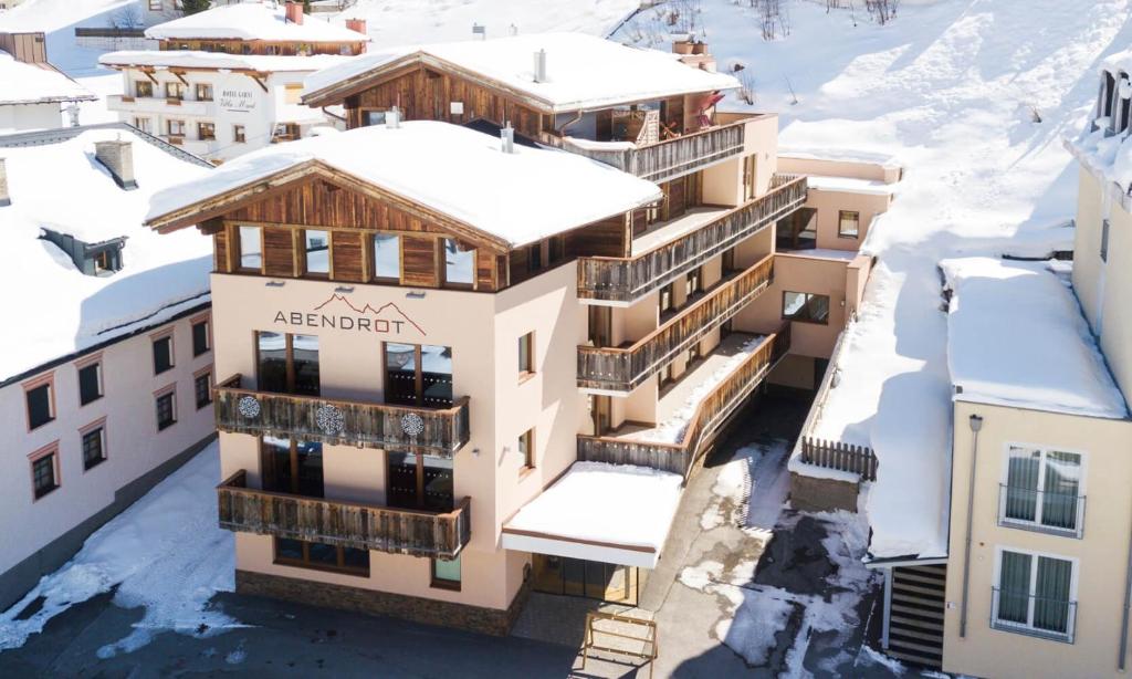 an aerial view of a building in the snow at Hotel Abendrot by Alpeffect Hotels in Ischgl