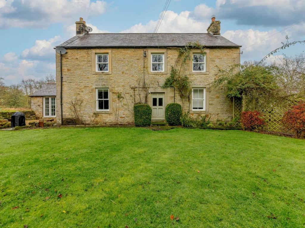 an old brick house with a large yard at 4 Bed in Hexham oc-90521 in Bardon Mill