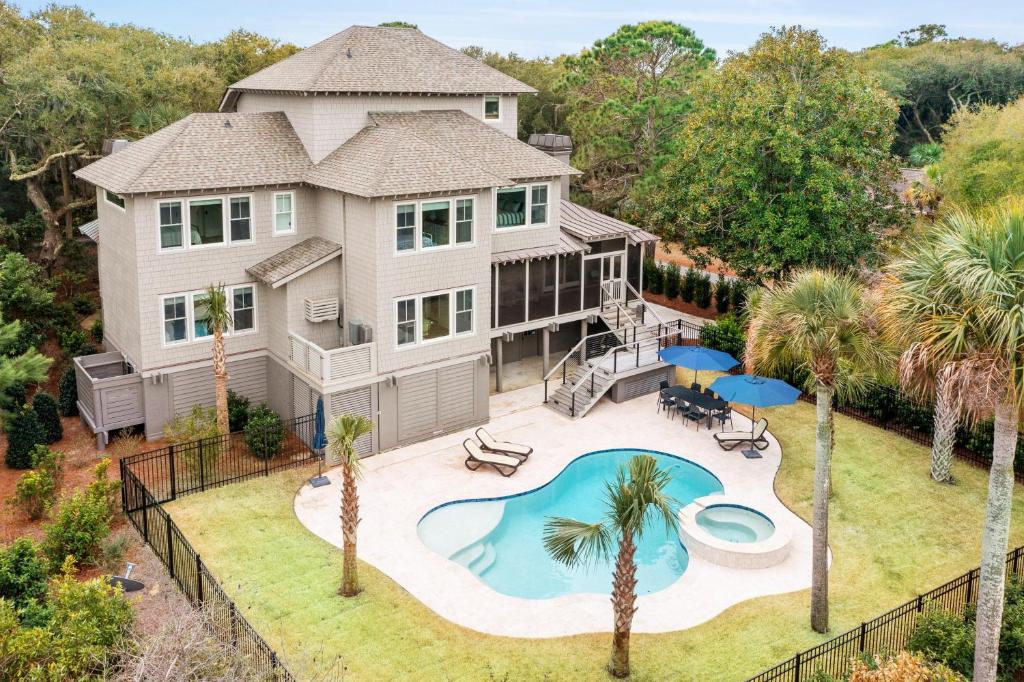 an aerial view of a house with a swimming pool at 3 Surfsong in Kiawah Island