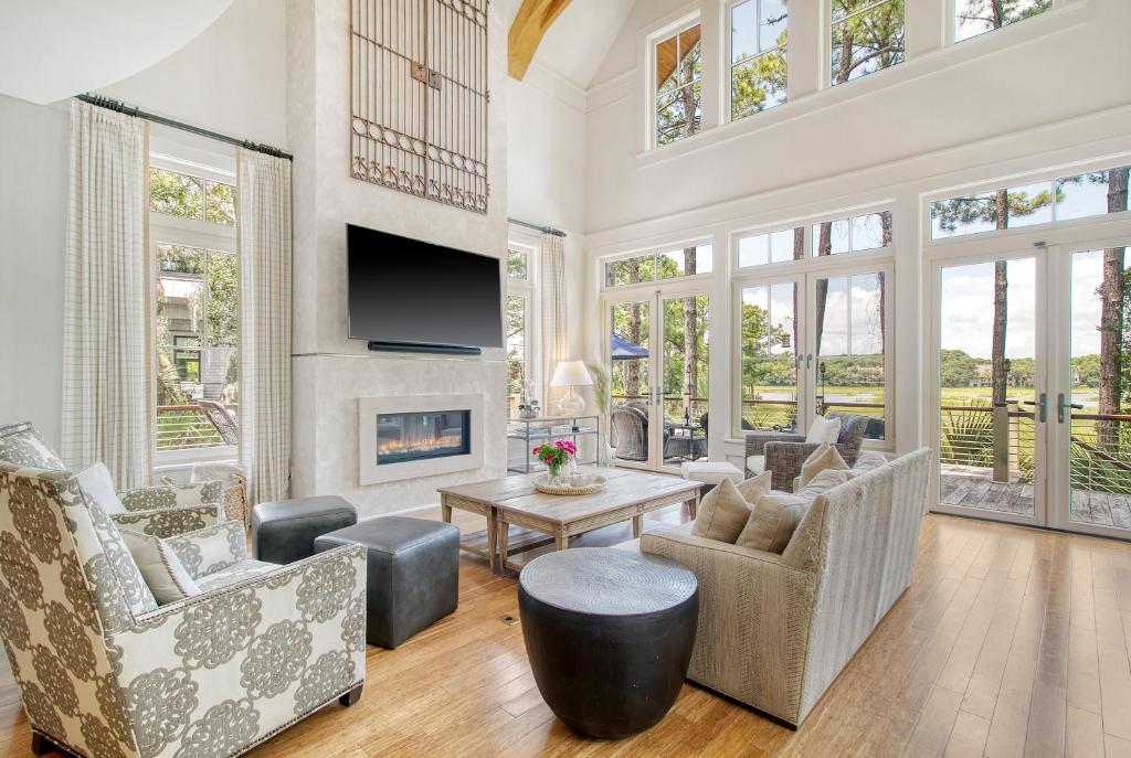 a living room filled with furniture and a fireplace at 119 Halona Ln in Kiawah Island