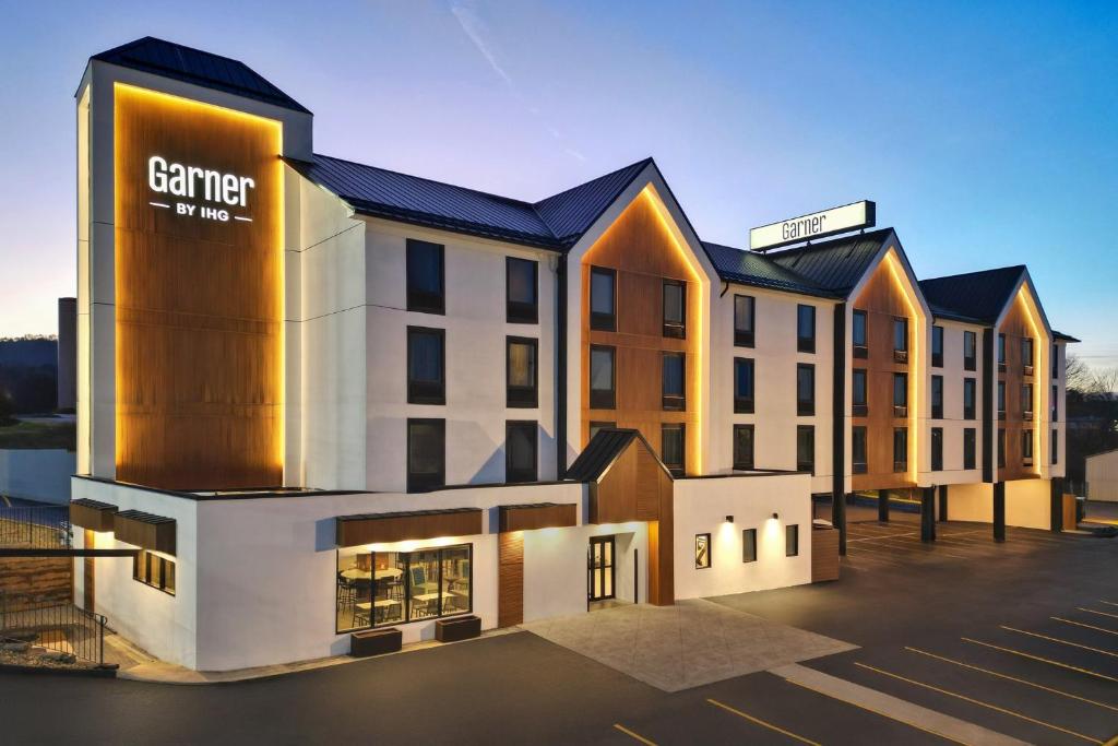 a building with a sign on the front of it at Garner Hotel Pigeon Forge Downtown by IHG in Pigeon Forge