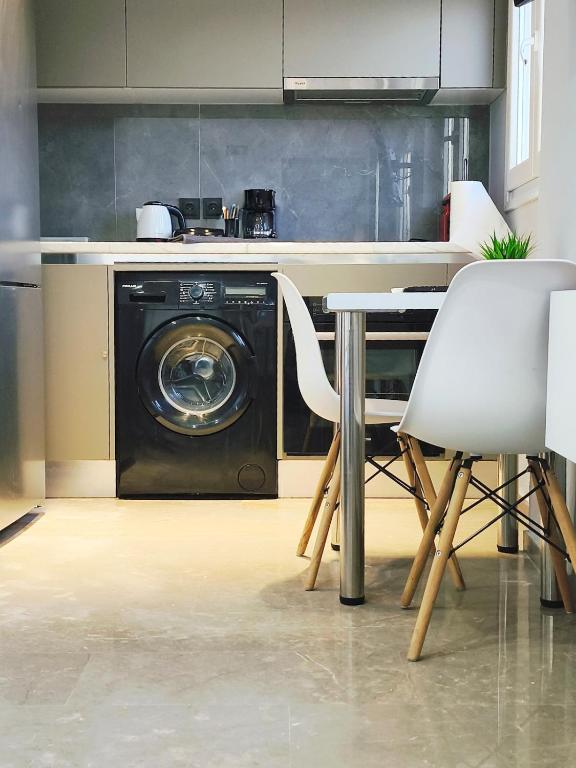 ครัวหรือมุมครัวของ Msquared Apartment 3