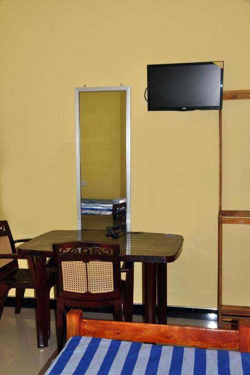TV a/nebo společenská místnost v ubytování Hotel Pearl Gate