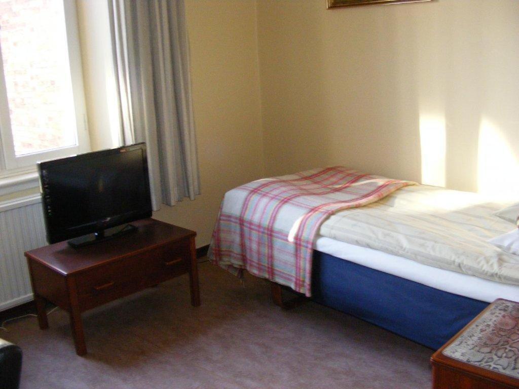 TV a/nebo společenská místnost v ubytování Hotel Continental Malmö