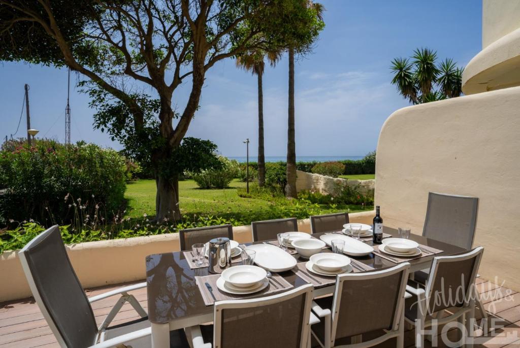Holidays & Home BeachFront Neptuno II, garden, beach, pool ,Elviria ,Marbella