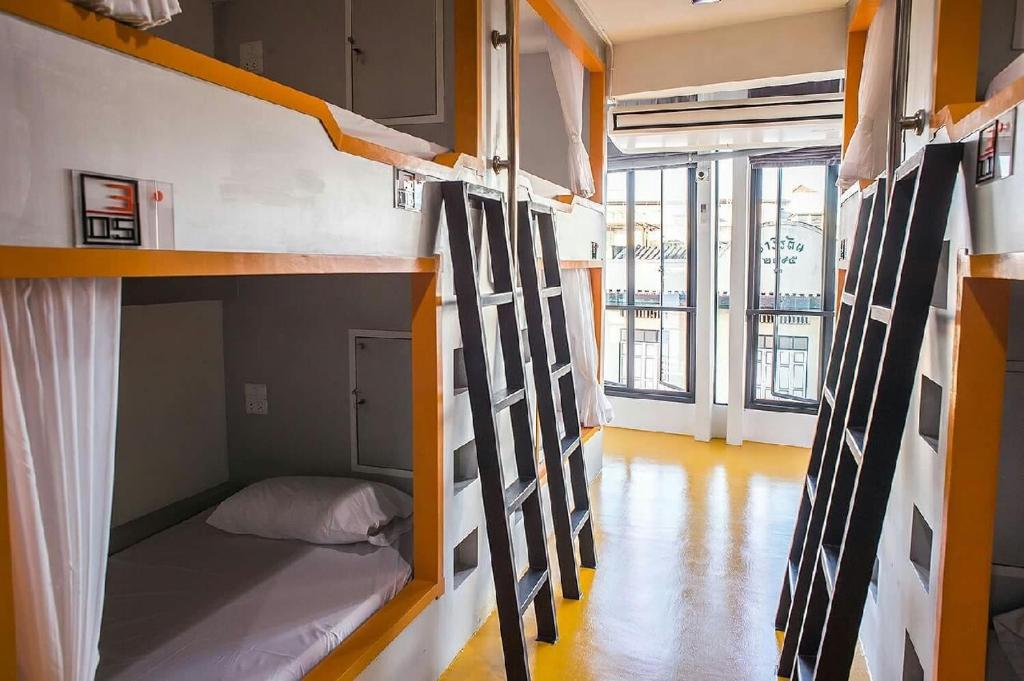 Postel nebo postele na pokoji v ubytování The Port Hostel