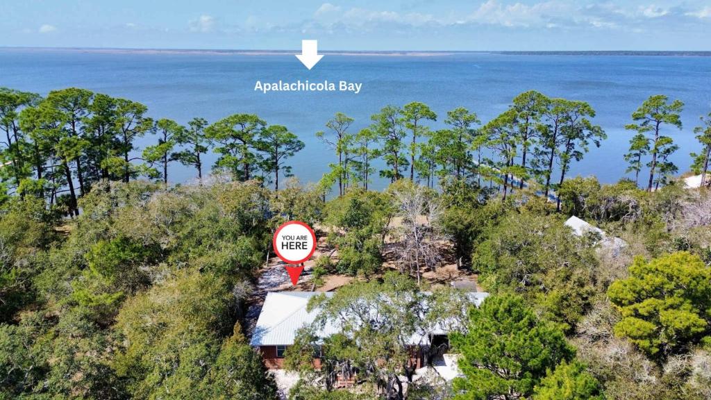 an aerial view of the ocean with a road sign at Bayfront- 2mins from Boat Launch in Eastpoint