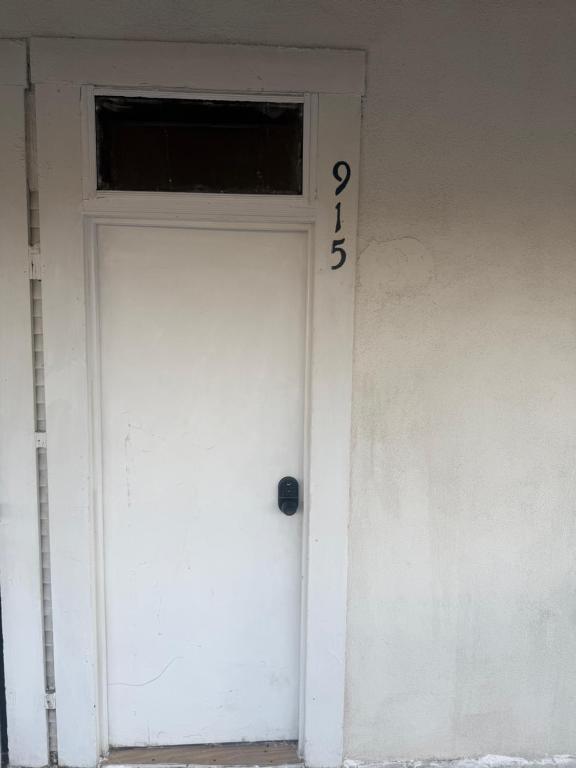 a white door with the number on it at Downtown Taylor Private Entry Room 2 in Phoenix