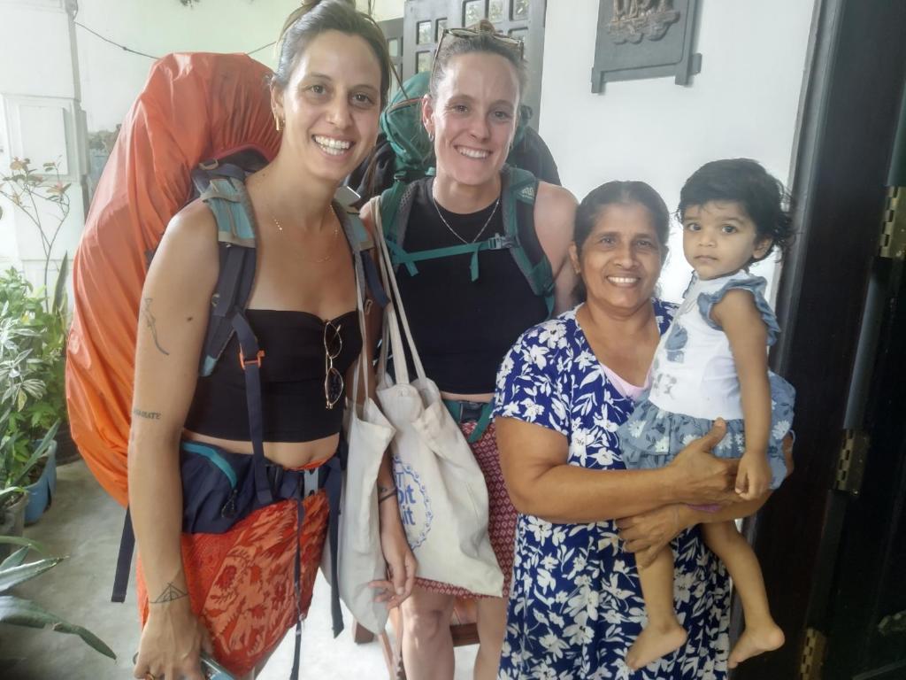 a group of people posing for a picture at ADOBE AFFECTIOn in Tangalle