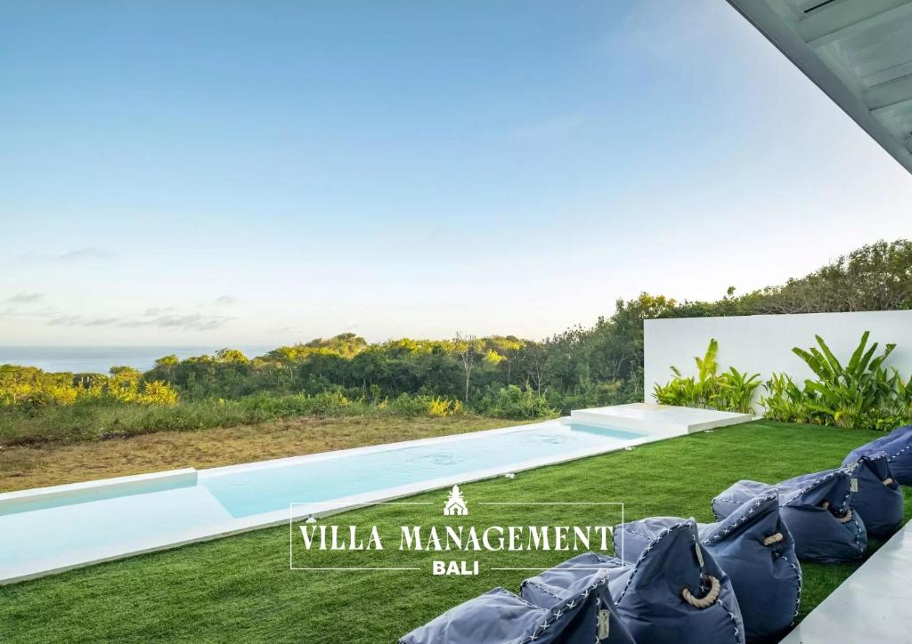 a view of the villa management ball in the backyard at Villa Maracuya in Pecatu Bali - Spacious 3 Bedroom with Pool in Badung