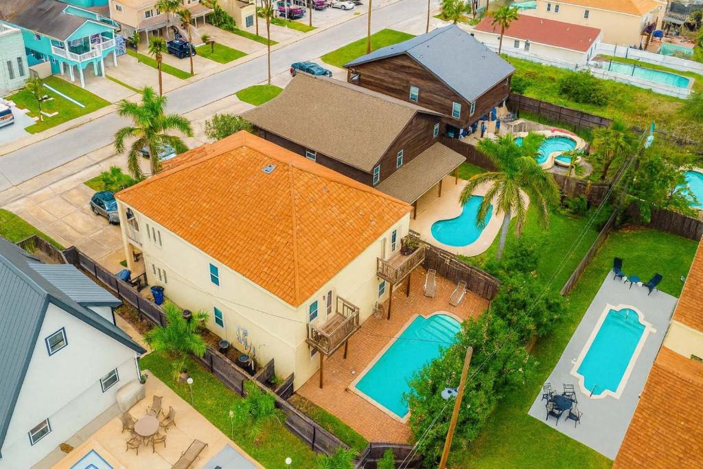 an overhead view of a house with a swimming pool at Super near Beach Cozy 4 plex Pool Sleep Many in South Padre Island