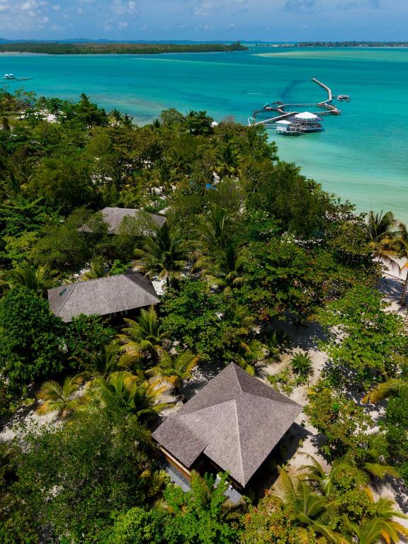 an aerial view of a resort with trees and the ocean at Leebong Island Resort in Leebong