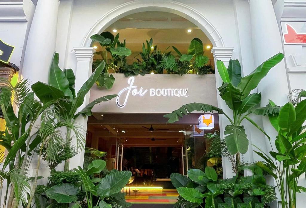 a store front with plants in front of it at Joi Boutique Bãi Trước in Vung Tau