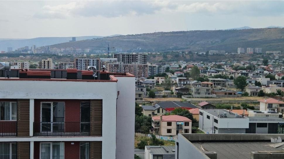 a view of a city with buildings and mountains at Tbilisi- Georgia in Tbilisi City