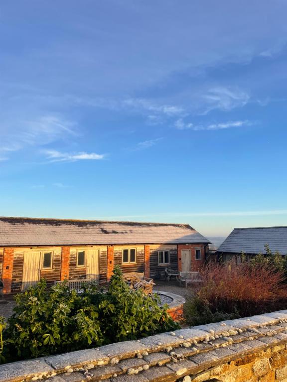a view of a row of houses from a balcony at Cool Contours Venue in Eydon