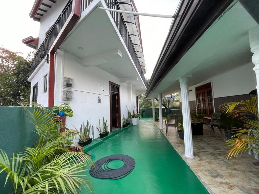 a swimming pool in the middle of a house at Lipton View Inn near Ella & Haputhale in Bandarawela