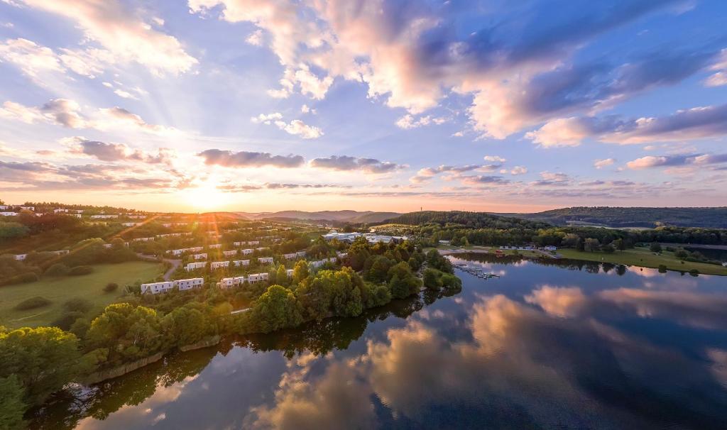 an aerial view of a river at sunset at Center Parcs Bostalsee Saarland in Nohfelden