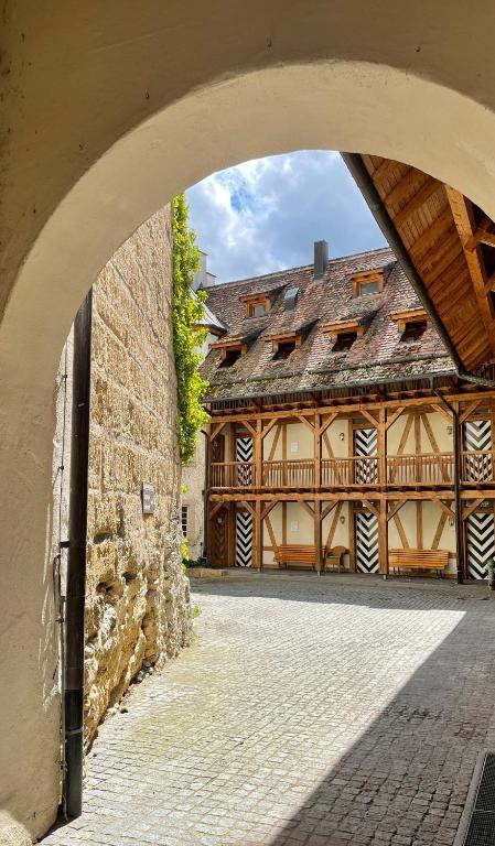 an archway in front of an old building at Schloss Blumenfeld in Tengen