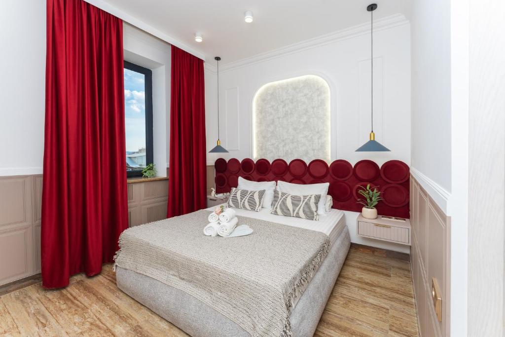 Llit o llits en una habitació de Alex Hotel