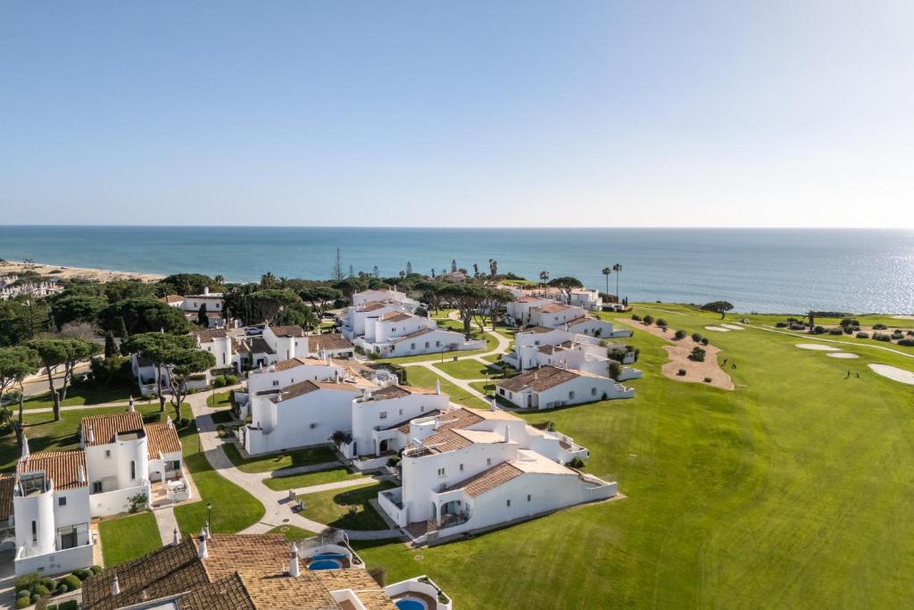 an aerial view of a village next to the ocean at Casa Mimosa by Algarve Holidays in Vale do Lobo