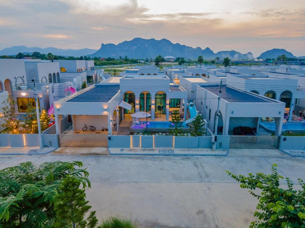 an aerial view of a large white building at CC POOL VILLA พลูวิลล่าcha-am in Cha Am