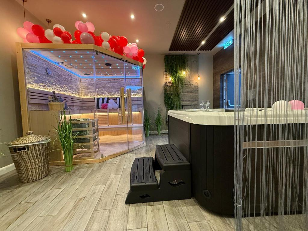 a lobby of a store with a large aquarium at The Party Hub in Boston