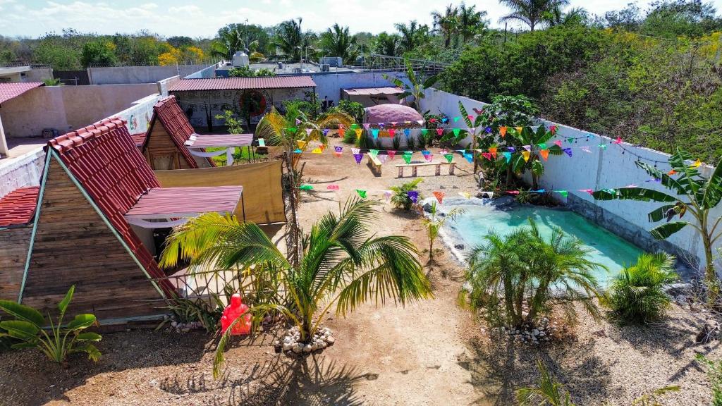 an aerial view of a backyard with a swimming pool at Las siete lunas in Ucú