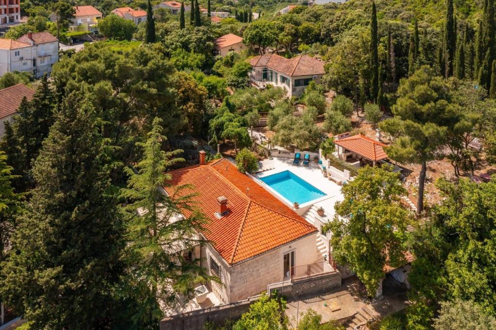 an aerial view of a house with an orange roof at New Luxury Villa Korcula Timeless with private pool, Free Parking, Seafront, for 6 persons in Korčula