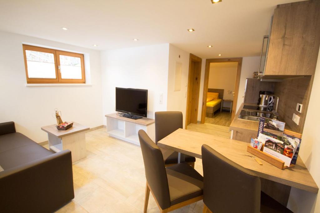 A television and/or entertainment centre at Haus Scheuerer