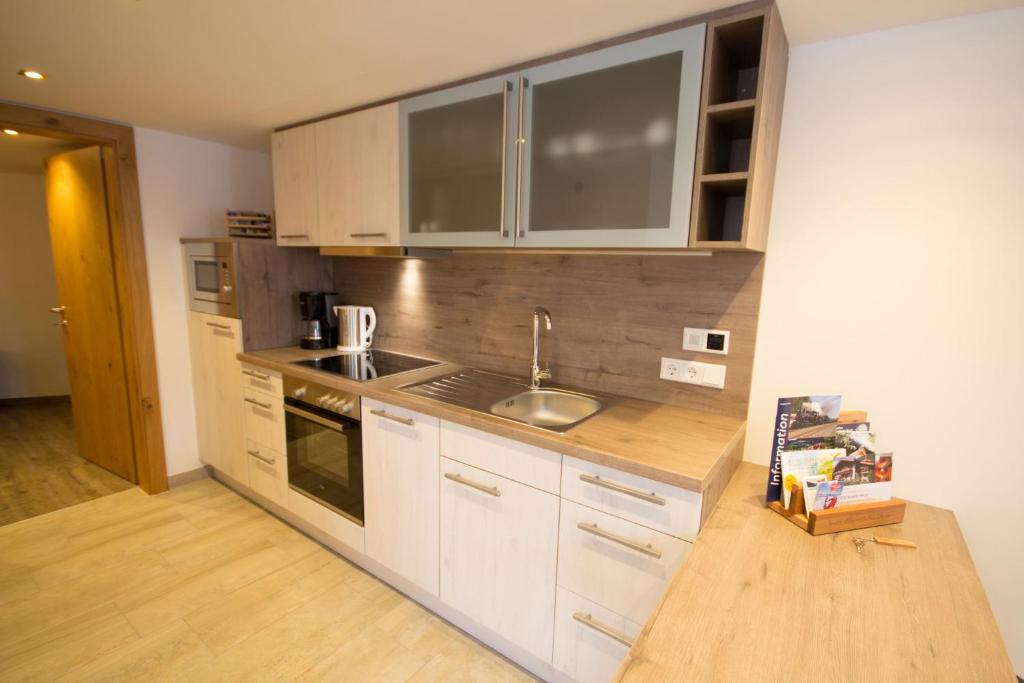 A kitchen or kitchenette at Haus Scheuerer