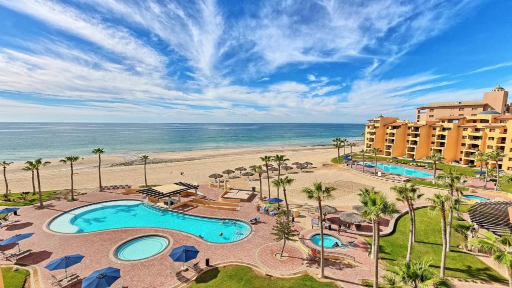 Two-Story 3-Bedroom Beachfront Penthouse at Princesa Resort - BeachBumCondos photo