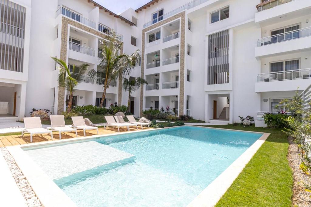 an image of a swimming pool in front of a building at 3 Bedroom Villa in Estrella in Dominica