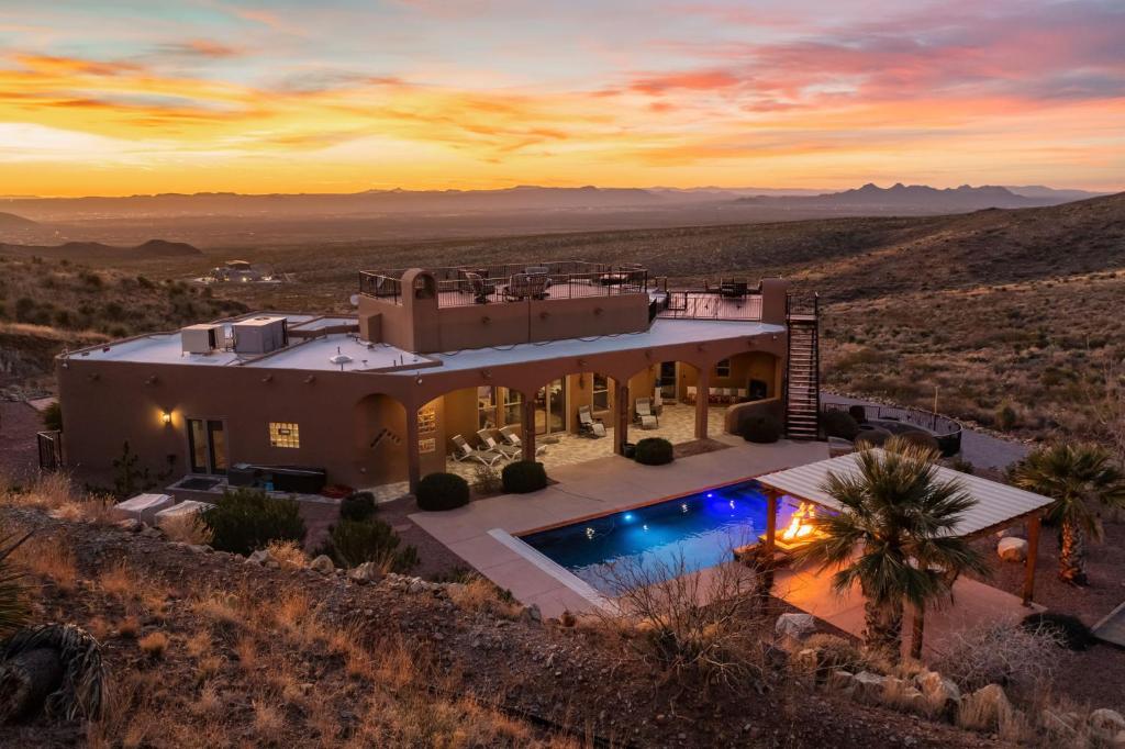 an aerial view of a house in the desert at Secluded Retreat Pool Spa Sauna Rooftop Deck in Las Cruces