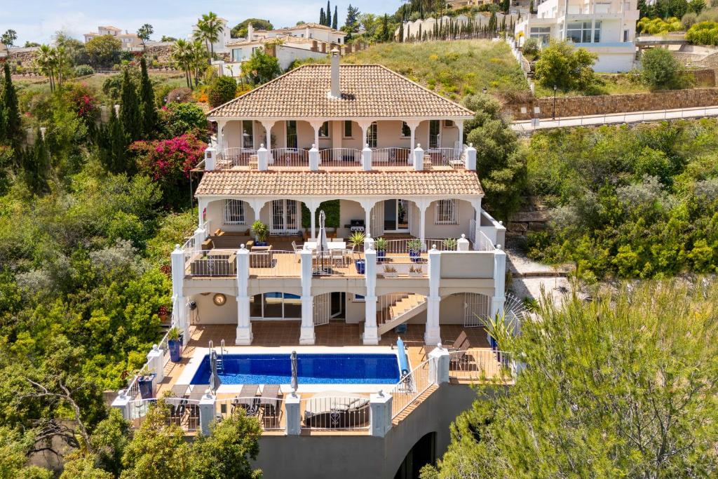 an aerial view of a house with a swimming pool at Casa Lorna in Marbella