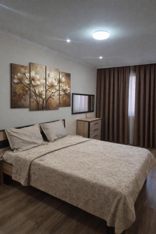 Llit o llits en una habitació de Apartament Balti