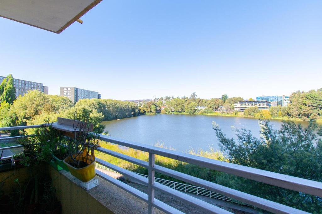a view of a river from a balcony at Vista Premium Laguna Centro Concepción in Concepción