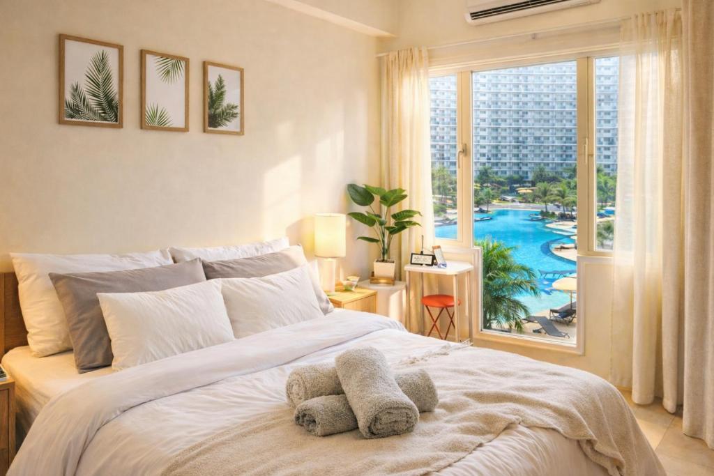 633 Air Condo 1BR Shell Residences 2 Min to MOA Images