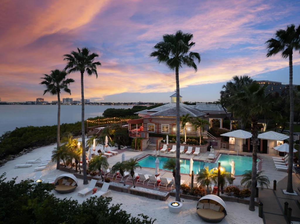 an aerial view of a resort with a pool and palm trees at Grand Hyatt Tampa Bay in Tampa