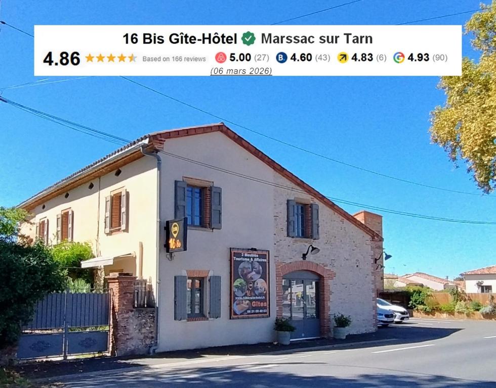 a picture of a building on a street at 16 Bis-Gîte-Hôtel-Appartement in Marssac-sur-Tarn