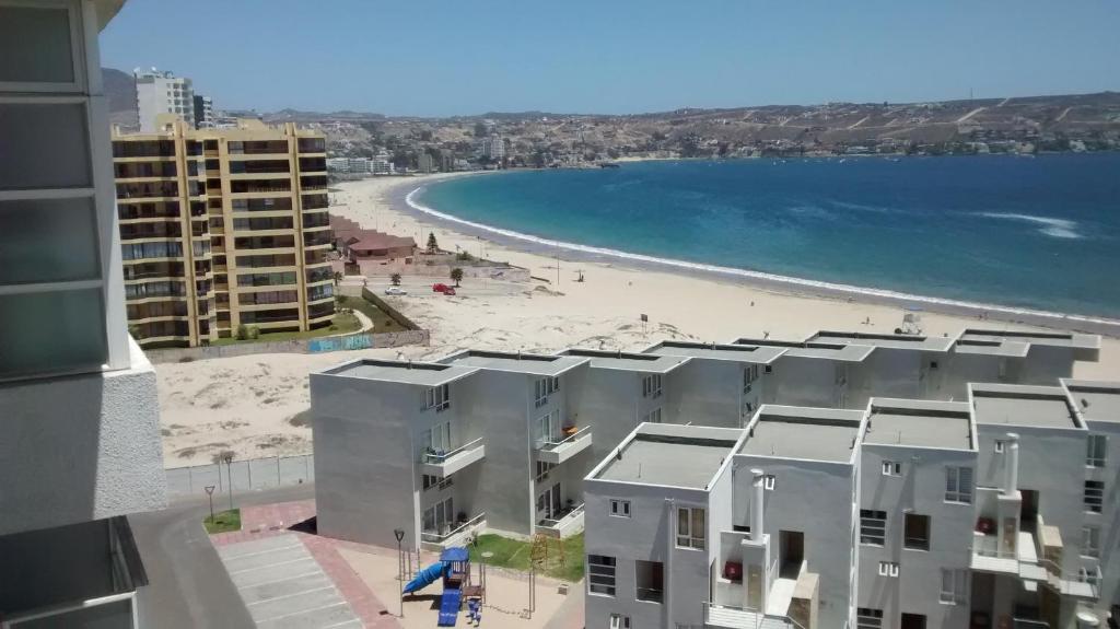an aerial view of the beach and buildings at Ovaser I in Coquimbo