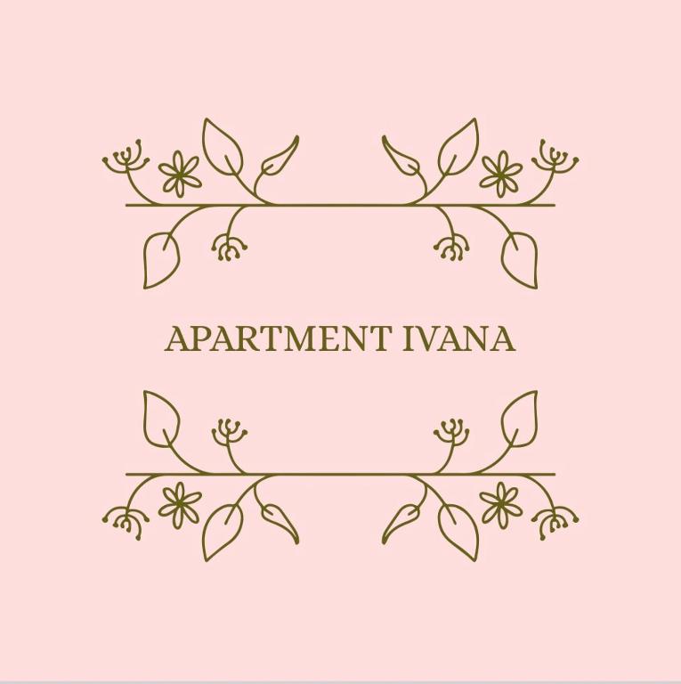 a branch of a plant with leaves and flowers at Apartment Ivana in Murter