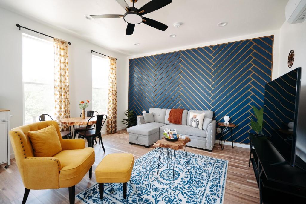 a living room with a couch and a table at Windbird Mountain Retreat STR-300 in Buena Vista