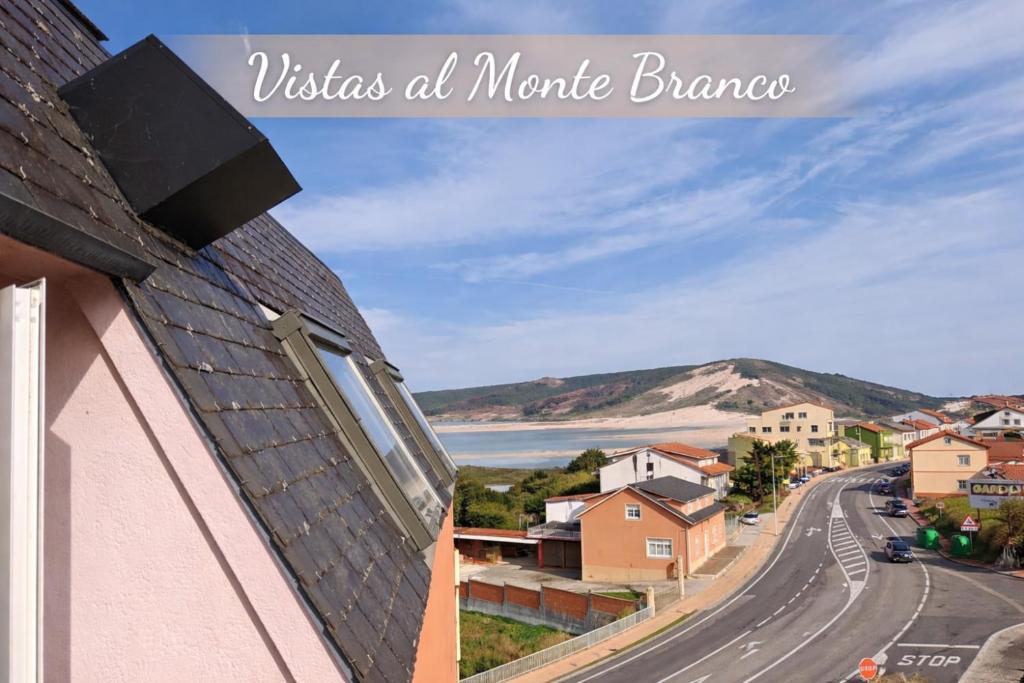 a view of the beach from a house at Mar de Laxe Vistas al mar y Costa da Morte in Cabana de Bergantiños