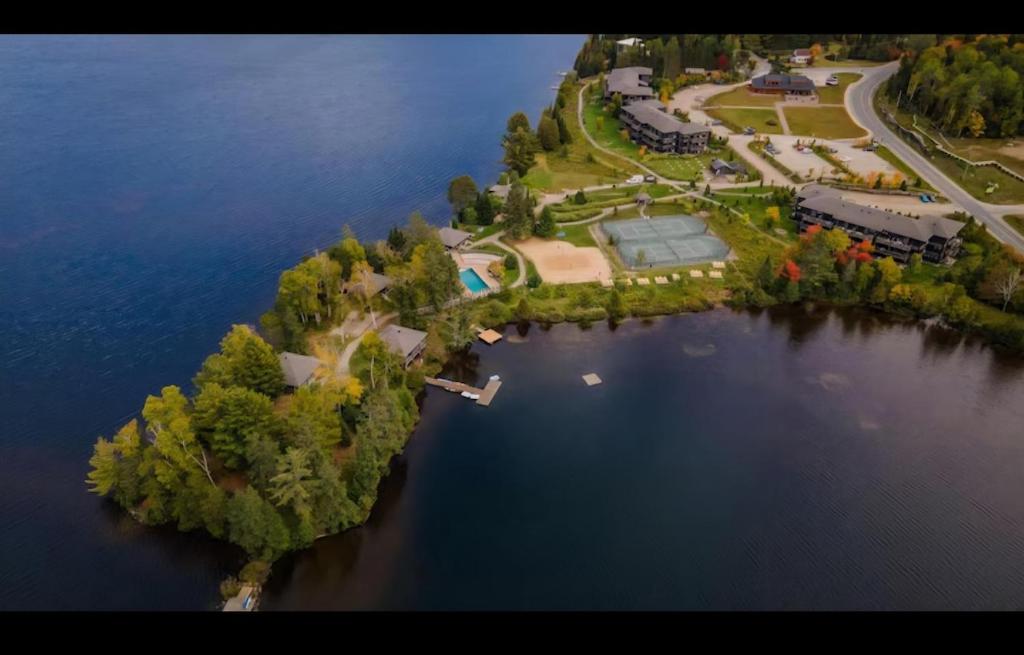 an aerial view of an island in the water at 3306 Studio, Condo sur le Lac in Lac-Superieur
