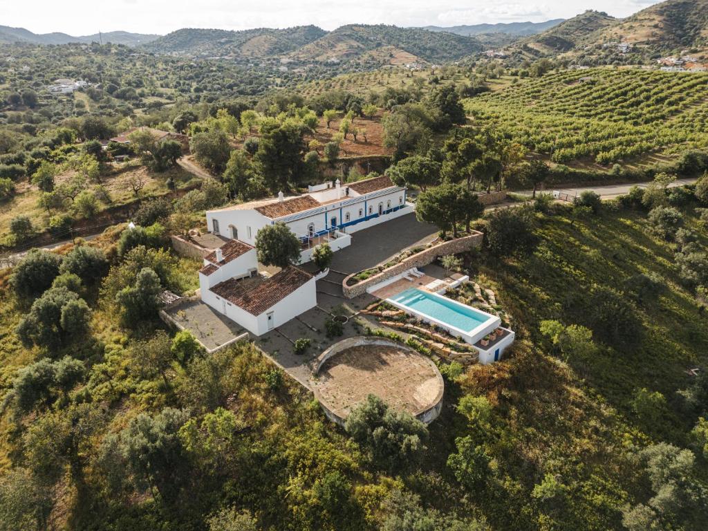 an aerial view of a villa with a swimming pool at Monte da Torre in Tavira